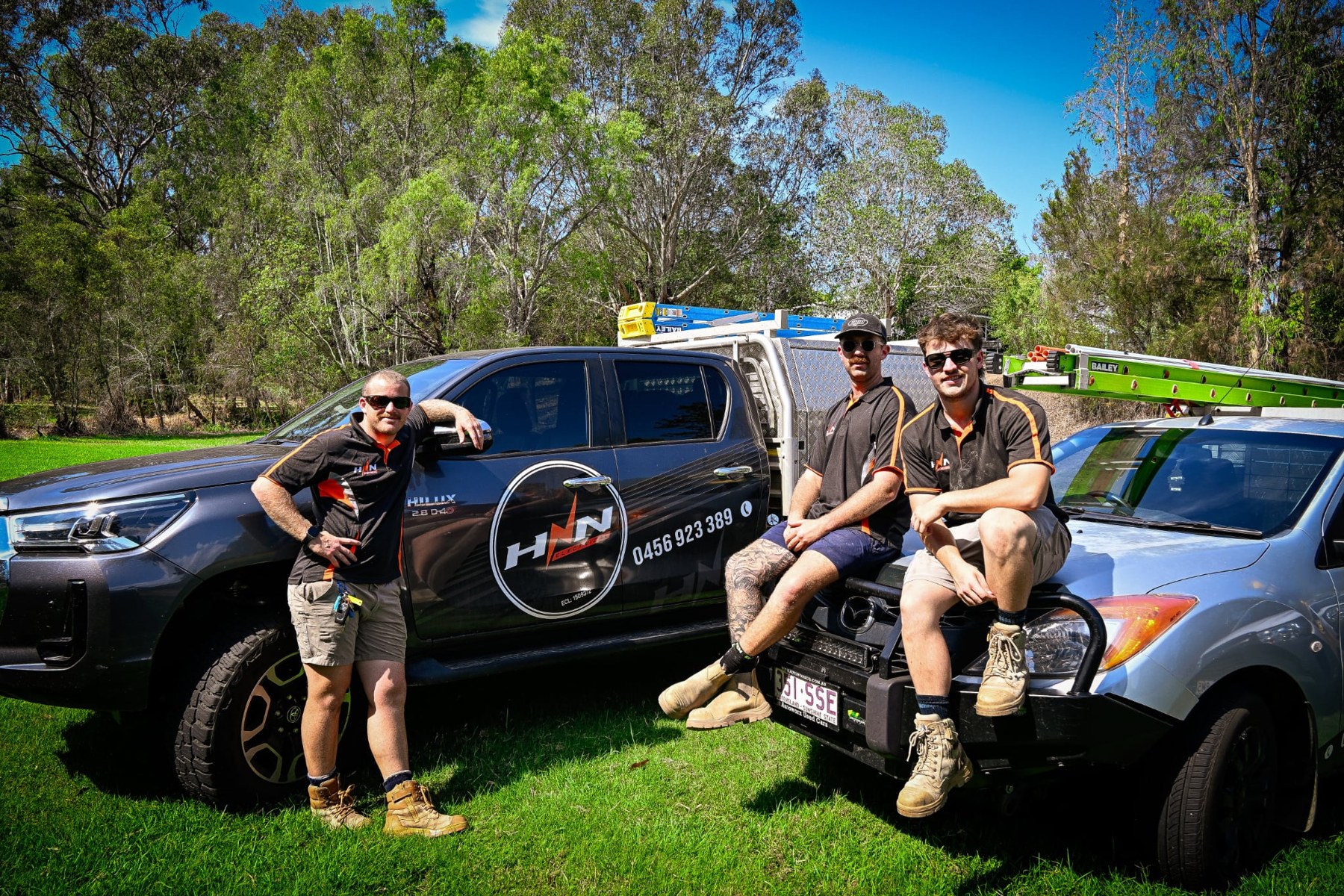 HNN Electrical team with their company vehicles